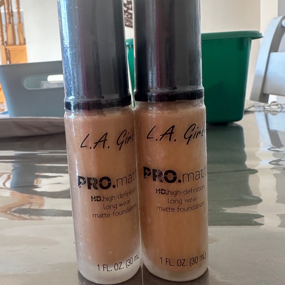 Two L.A. Girle Pro matte high definition long wear matte foundation shade cafe
